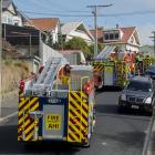 Fire trucks line the hill in Embo St, Caversham, as Fire and Emergency New Zealand responds to a...