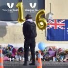 Outpourings of grief and love are filling the wall above a makeshift memorial to Enere Mclaren...