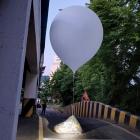 A balloon believed to have been sent by North Korea, carrying various objects including what...