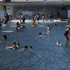 People cool off at the Yards Park splash pool amid a heat wave in Washington, D.C. Photo: Reuters