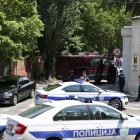 Police officers secure the area after the attack near the Israeli embassy in Belgrade. Photo:...