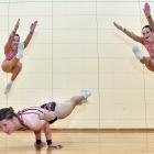 Striking a pose are Queen’s Aerobics club members and world championships qualifiers (from left)...