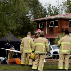 Ambulance had to be alerted by phone about a fatal fire in Auckland last month. Photo: RNZ