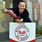 Bakehouse on Bond George St and Frederick St store manager Tenniell Anderton sauces up one of the...