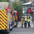 Firefighters deal with a hazardous substance spill caused by a pupil’s science project at Dunedin...