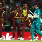 West Indies players celebrate the wicket of New Zealand captain Kane Williamson. Photo: Getty Images