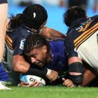 No 8 Hoskins Sotutu scores one of the Blues’ five tries in their Super Rugby Pacific semifinal...