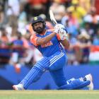 India's Rohit Sharma hits a six against Australia. Photo: Getty