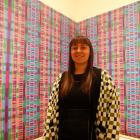 The new Forrester Gallery curator Anna McLean stands in front of Oamaru artist Maggie Covell’s...