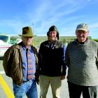 Murray Bowes (left) and Greymouth Aeroclub president Dave McMillan flank pilot Tom Williams on...