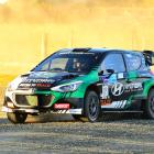 Leading New Zealand driver Hayden Paddon and co-driver Jared Hudson guide their Hyundai i20 AP4...
