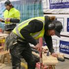 Building apprentices Chris Miller, of Dunedin, foreground, and James Isted-Salmon, of Queenstown,...