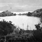 Pigeon Island’s lake, with a small island, on the South Island’s Lake Wanaka. — Otago Witness, 19...