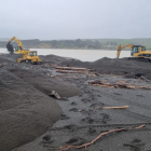 Heavy machinery is being used to clear the Wairoa river mouth. Photo: Hawkes Bay Regional Council