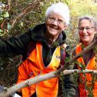 Tackling Darwin’s barberry are Swat members Moira Parker (left) and Fran Hammond. PHOTOS: SIMON...