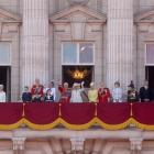 King Charles and Queen Camilla (centre) with members of the royal family on the balcony at...