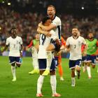 England's Harry Kane celebrates with Ollie Watkins after winning the match. Photo: Reuters 
