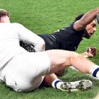 All Black wing Sevu Reece dots down for the first try of the test against England at Forsyth Barr...