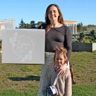 Blessed Box charity founder Olivia Mathieson and her daughter Penelope, 4, show off the charity’s...