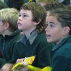 St Gerard’s School pupils Hudson Lloyd (left) and Tana Lemuelu, both 8, strum along during the...