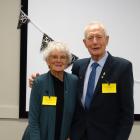 Former Gore Toastmasters Club members Lorraine Simpson and John Falconer cut the club’s 50th...