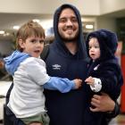 New Zealand-born England rugby player Ethan Roots — with his sons Noah, 3, and Benji, 11 months —...