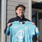 Invercargill teenager Jessie Sanford proudly shows the jersey he was given by New Zealand...