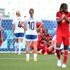 Canada's Cloe Lacasse celebrates scoring her team's first goal during the match against New...