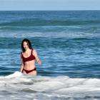 Auckland visitor Indi Mortimore takes a dip in the ocean at St Clair in April. According to Stats...