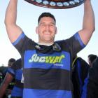 Excelsior captain Mat Duff lifts the Citizens Shield, the club’s first title since 1997. PHOTO:...