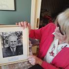 North Otago Early Settlers Association president Helen Stead looks at a photo of former...