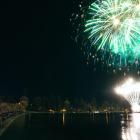 Queenstown’s lakefront is lit up during the town’s annual DFS midwinter fireworks display on...