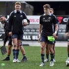 Beauden Barrett (right) and younger brother Jordie compete in a kicking game at the end of the...