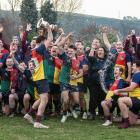 Clutha Valley players and supporters celebrate victory over West Taieri in the Southern Region...