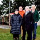 Keeping the community informed are Aramoana Civil Defence Committee members (from left) Vicki...