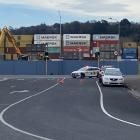 Police in Kitchener St amid a heavy presence in Dunedin's industrial area on Friday. Photo: Craig...