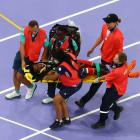 Ethiopia's Lamecha Girma was taken to hospital after falling heavily in the steeplechase. Photo:...