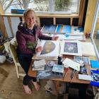 Albert Town artist Chrissy Wickes prepares art for her upcoming talk and exhibition on the...