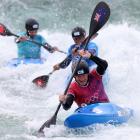 Finn Butcher competes in the first round of the kayak cross in Paris yesterday. PHOTO: GETTY IMAGES