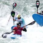 Finn Butcher charges to victory in his kayak cross heat in Paris yesterday. PHOTO: GETTY IMAGES