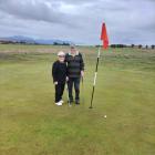 Kelvin and Betty Simkin at the Karamea Golf Club. PHOTO: GREYMOUTH STAR