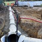 Contractors work on replacing water pipes in suburban Dunedin. PHOTO: PETER MCINTOSH