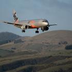 A Jetstar Airbus A320 comes in to land at Dunedin Airport. PHOTO: ODT FILES