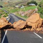 Clay boulders slipped on to The Nuggets Rd in South Otago on Sunday night and were found...