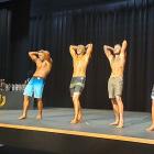 Lucas Russell (third from left) competes in the Novice Mr Body Board Shorts category, at National...