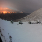 The sun rises over a snowy Crown Range summit this morning. Screengrab: MetService webcam