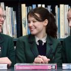 Columba College debaters (from left) Jessica Mundy, 17, Emily Roy, 15, and Clara Ballantyne, 18,...