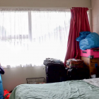 Belongings in a room used as emergency housing (file photo). Photo: RNZ