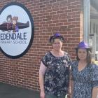 Edendale Primary School acting principal Jenny Coyle (left) and teacher Abby Duffy wear purple...