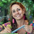 Project leader Gianna Savoie holds a replica Moriori bone flute, which is...